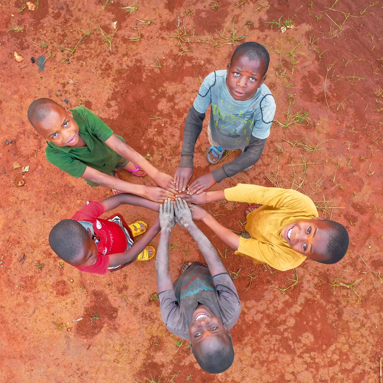 Children joining hands in a circle